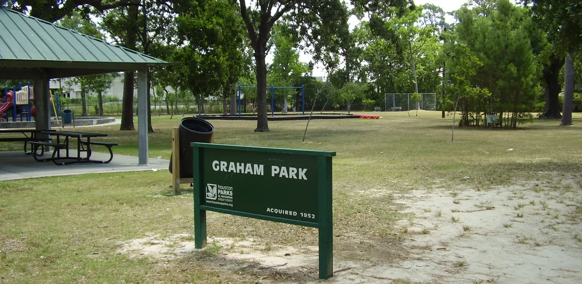 Graham Park entrance sign, picnic shelter and trees in Houston.