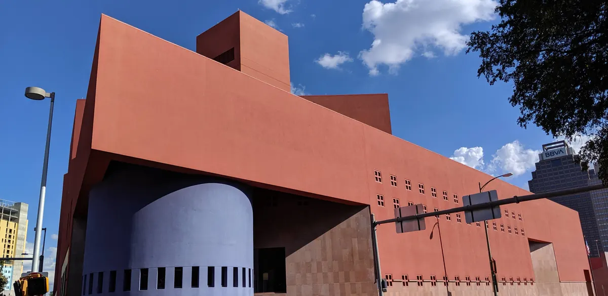 Orange exterior of the Central Library at 600 Soledad Street in San Antonio.