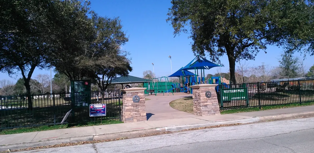 Entrance and playground at Westbury Park in Houston.